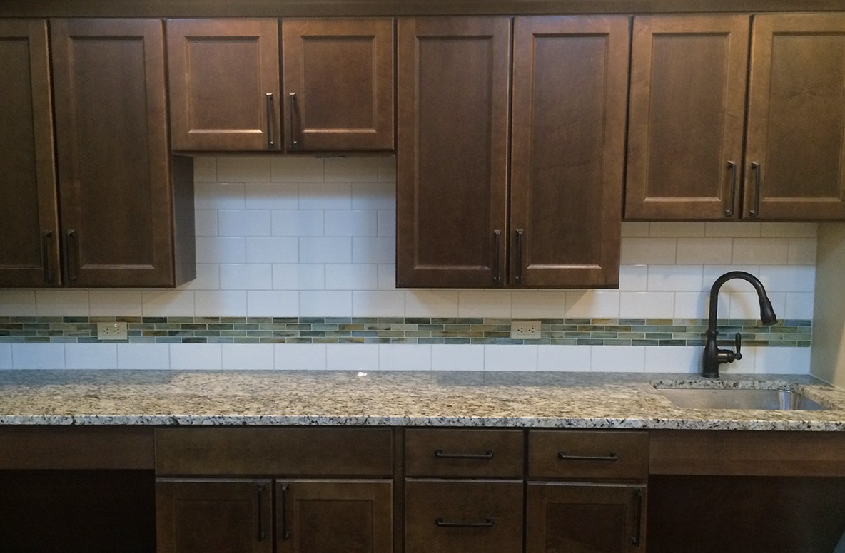 Ceramic Backsplash with glass listellos